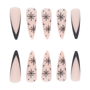Long almond press-on nails with black V-French tips and winter snowflake patterns
