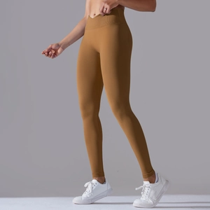 Detailed side view of high-waist seamless yoga leggings with V-shaped waistband