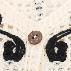 Retro hollow knit vest with crochet trim and dark brown wooden button detail