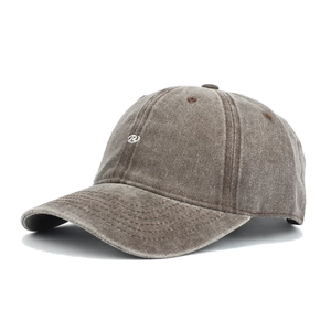 Detail of vintage washed cotton baseball cap featuring embroidered R letter logo