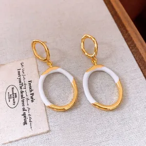 French vintage gold plated irregular geometric earrings with white enamel finish