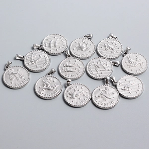 Twelve zodiac sign pendants in silver stainless steel with engraved names and symbols