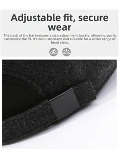 Detail view of the adjustable metal buckle and thick wool texture on this winter baseball cap