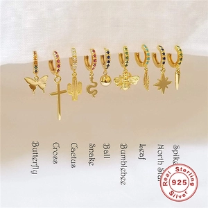 Collection of gold S925 sterling silver hoop earrings with butterfly and star pendants