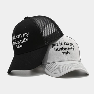 Vintage embroidered trucker hats in black and grey with breathable mesh and curved brim