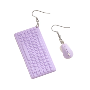 Close-up of asymmetric purple mini keyboard and mouse earrings with detailed keys