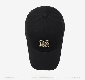 Top view of a black baseball cap featuring detailed gold embroidery of 10 ONWARD