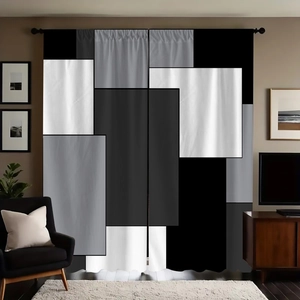 Detail of modern geometric black and grey blackout curtains with rod pocket design