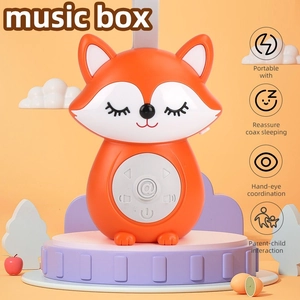 Portable fox baby sleep soother music player with white noise on a purple stage