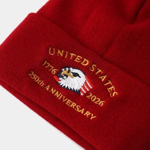 Red knit beanie with 250th anniversary United States eagle embroidery and flag motif