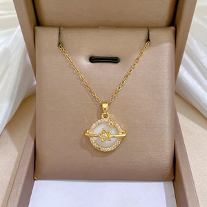 Elegant gold titanium steel necklace with a shell planet zircon pendant on velvet