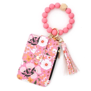 Porte-cartes à motif floral avec bracelet en perles de silicone rose et pompon élégant