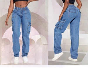 Detailed view of women's vintage denim cargo pants with multiple utility pockets in blue
