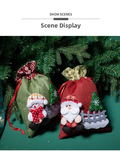 Detailed view of red Santa and green Snowman 3D applique drawstring Christmas gift bags