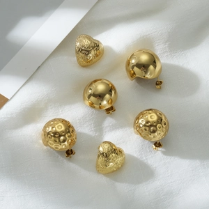 Golden earrings set with heart hammer texture, mirror finish ball, and honeycomb pattern