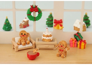 Macro view of a cozy miniature Christmas scene with gingerbread man and festive resin decor