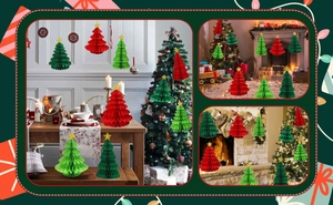 Close-up of honeycomb paper Christmas trees in red and green with golden stars