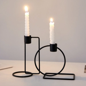 Modern black geometric metal candle holders in minimalist iron design for dining decor