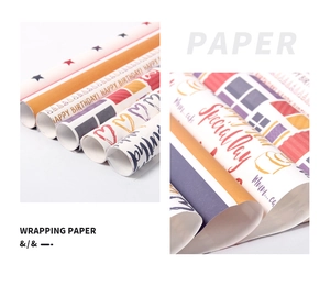 Detail of colorful star and heart pattern gift wrapping paper rolls with creative designs
