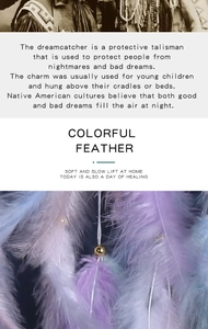 Detail of a handmade dreamcatcher with vibrant purple and blue feathers and gold beads