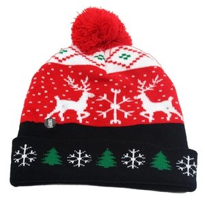 Colorful LED Christmas knit beanie featuring reindeer patterns and red pompom detail