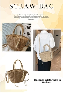 Detail of straw woven tote with pearl tassel, drawstring lining and long shoulder strap