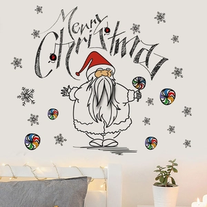 Detailed view of Santa wall stickers and Merry Christmas decals in a bedroom setting