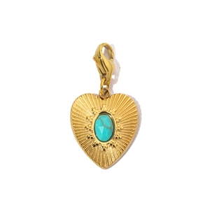 Detailed view of a golden heart pendant with blue stone inlay and lobster clasp