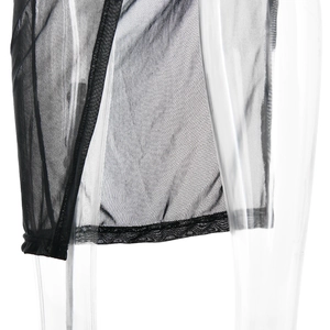 Detail of sheer black mesh skirt hem featuring delicate lace trim and fine texture