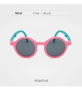 Front view of round frame kids sunglasses in pink and blue contrast color design