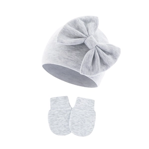 Detail view of cotton knit baby hat with bow and anti-scratch mittens in light heather grey