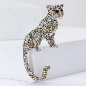 Detailed view of leopard brooch with sparkling silver alloy and multi-color rhinestones