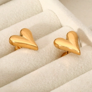 Polished 18k gold plated stainless steel heart stud earrings in a velvet jewelry box