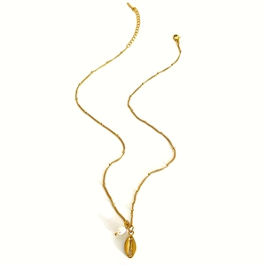 Golden titanium steel necklace with seashell pendant and freshwater pearl on white background
