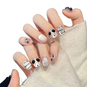 Cute cartoon cat paw press-on nails with silver cat-eye glitter and 3D bead decorations