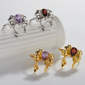 Elegant S925 sterling silver bow rings with teardrop gemstones in gold and silver finish