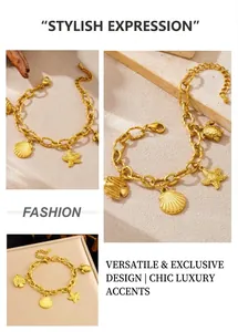 Detail of gold-plated bracelet featuring starfish, turtle, and scallop shell ocean charms