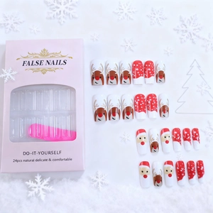 Christmas press-on nails set featuring Santa Claus and reindeer designs with glitter