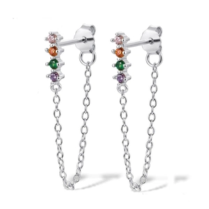 Detailed view of silver drop earrings with multi-color cubic zirconia and thin chain dangles