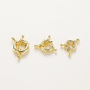 Macro detail of gold-plated sailor clasp spring buckles for DIY jewelry necklace making