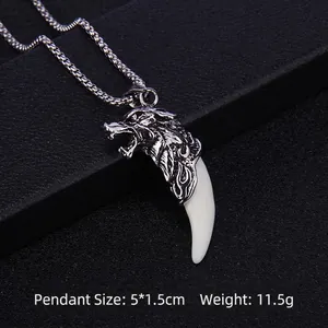 Vintage wolf head pendant necklace with white fang detail in antique silver finish