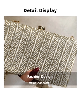 Close-up of gold and white chevron weave texture and metal clasp on acrylic evening bag