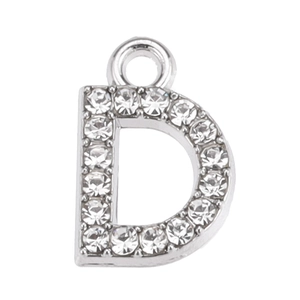 Close-up of silver-tone letter D pendant with sparkling crystal rhinestones for DIY