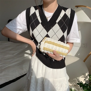 Detail of soft bubble texture pouch paired with casual outfit for lifestyle storage use