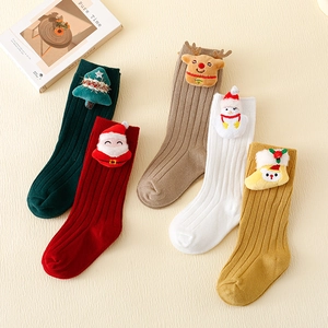 Five pairs of Christmas themed kids cotton socks with festive 3D cartoon characters