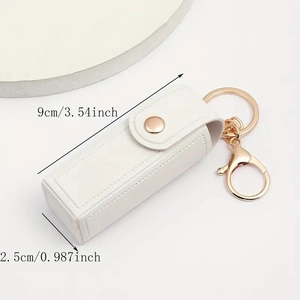 White lychee leather lipstick case keychain with gold snap and lobster clasp measurements
