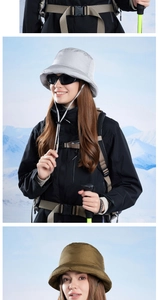 Detail of winter padded bucket hat with ear protection and windproof cord on snow mountain