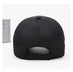 Rear view of black fishing hat with adjustable velcro strap and detailed stitching