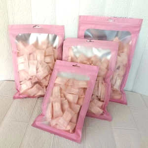 Pink resealable bags for disposable cotton towels with clear window and hanging hole