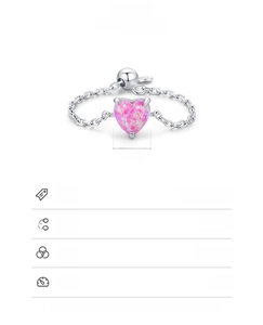 Macro shot of S925 sterling silver chain ring with 6mm heart pink opal stone